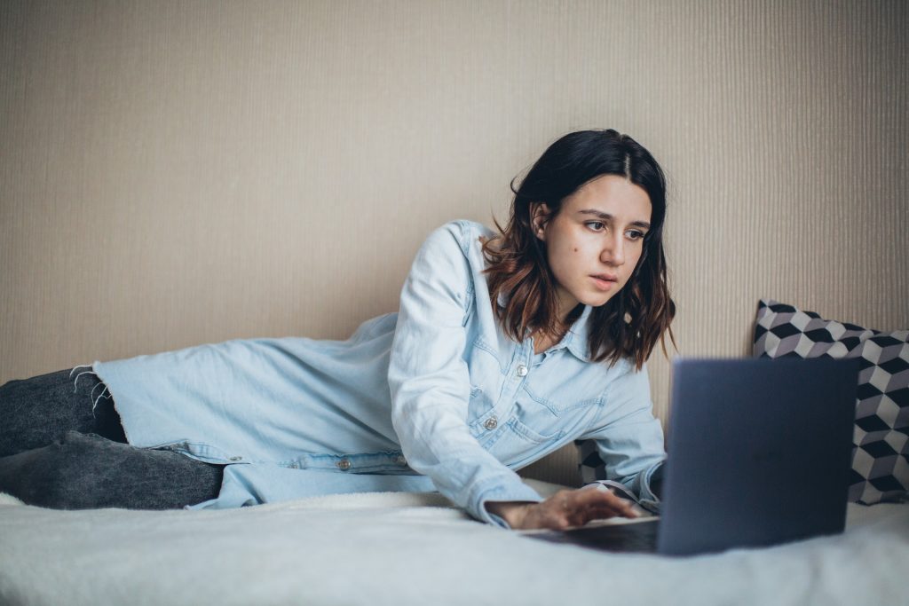 Girl looking at laptop