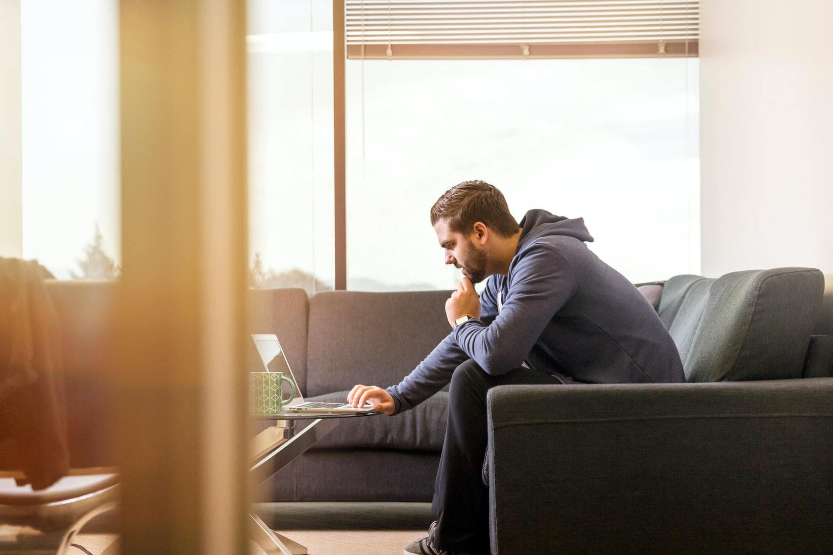 Man focused on laptop