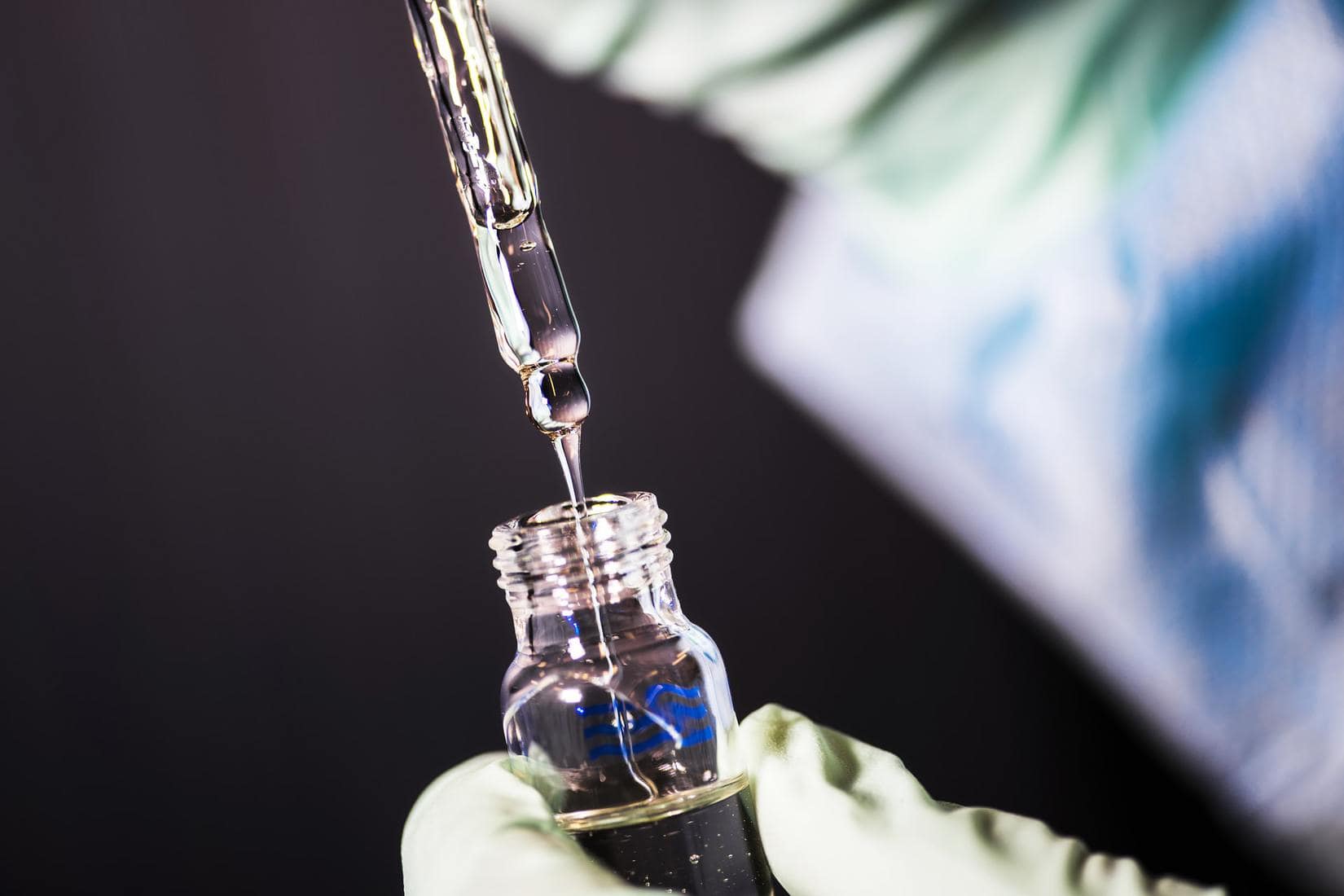 Medical worker holding vaccine