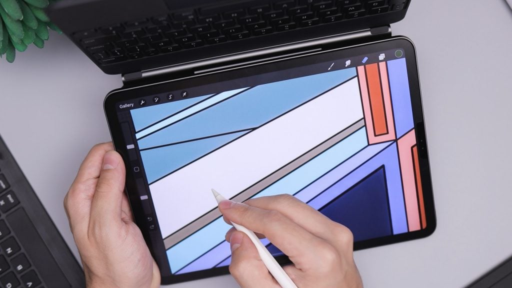 Person drawing on tablet