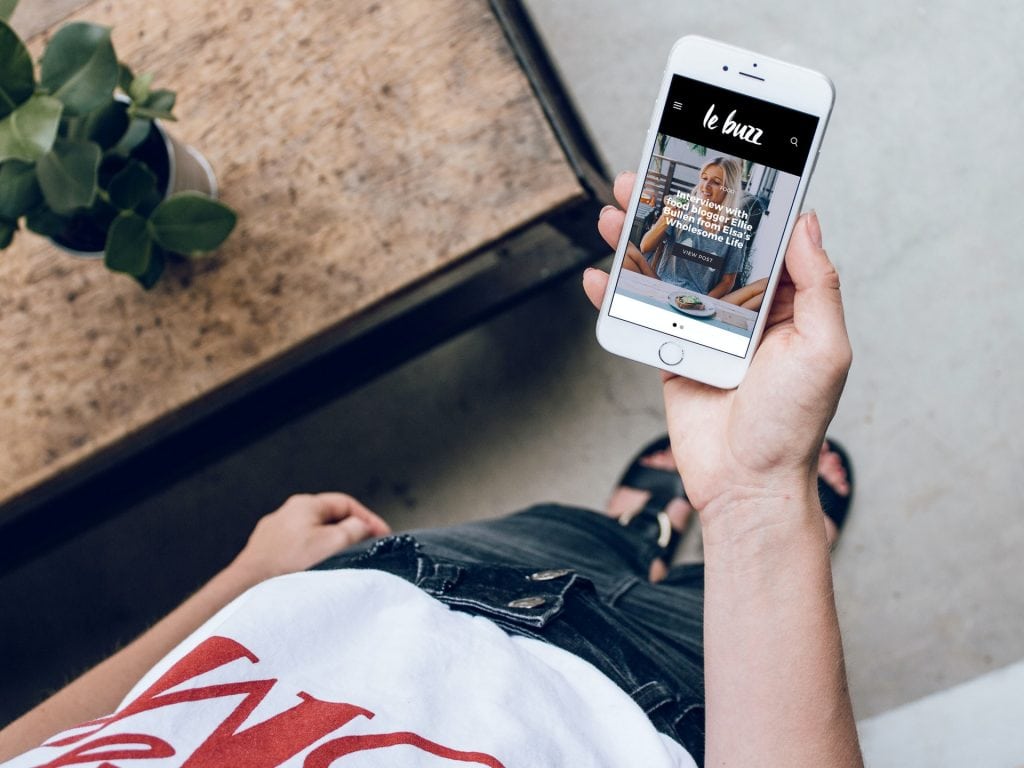 Le Buzz landing page on mobile phone