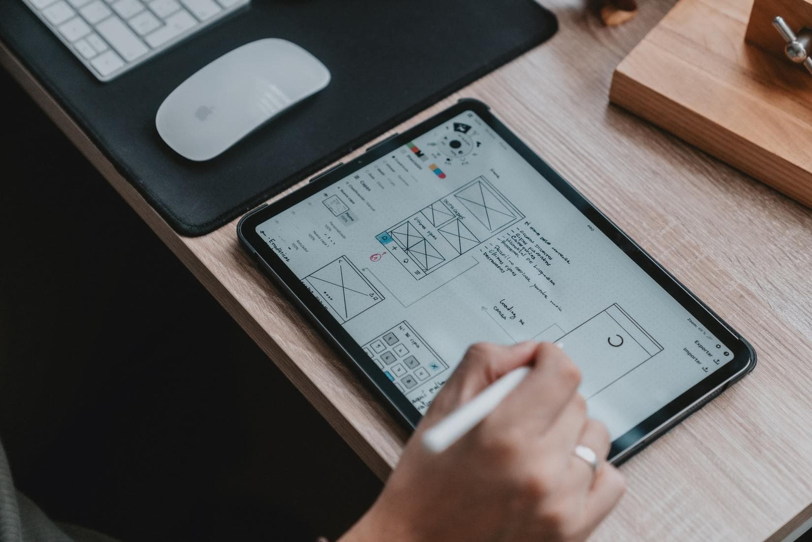 Person creating prototype on tablet