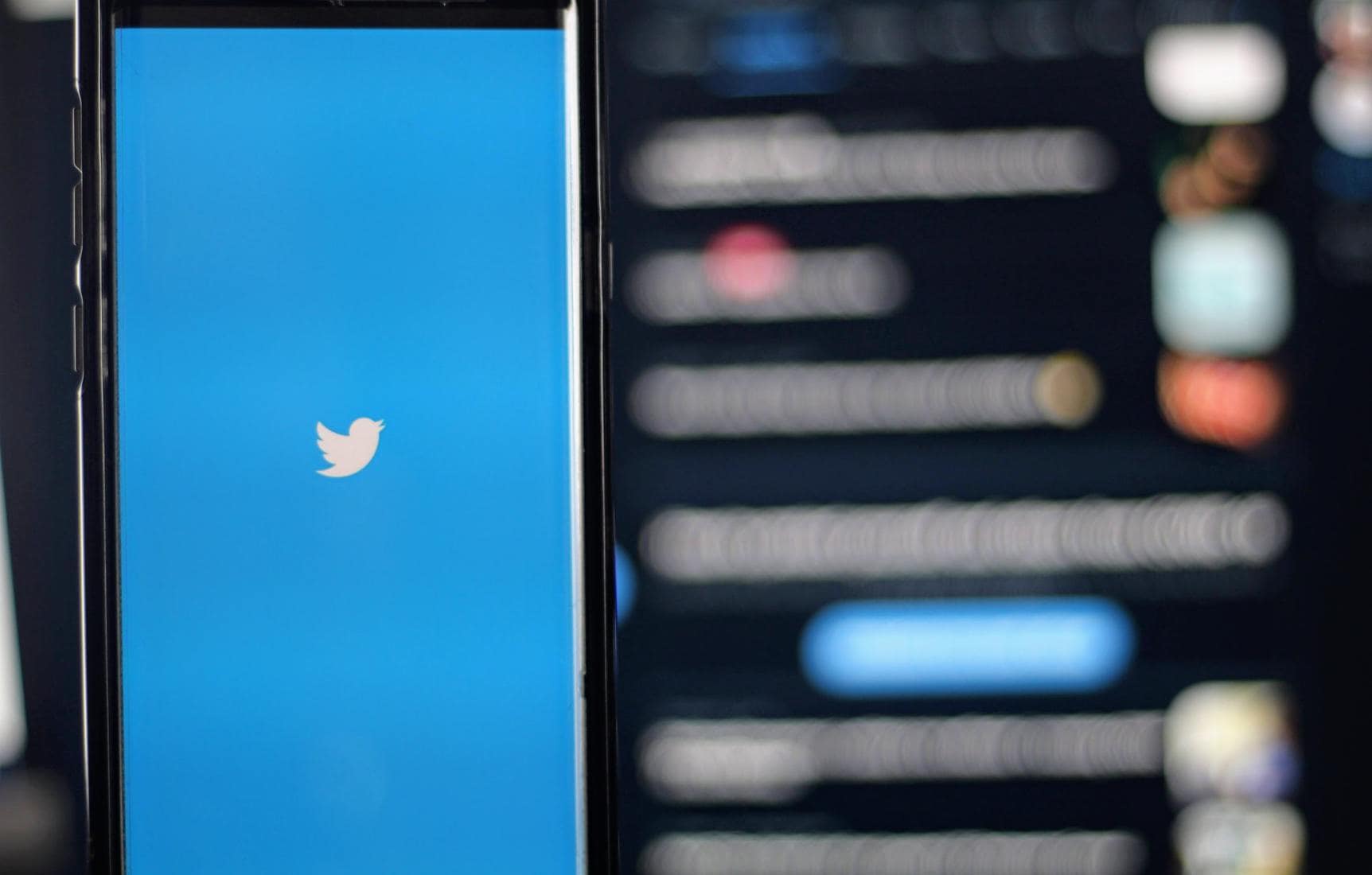 Phone showing Twitter logo