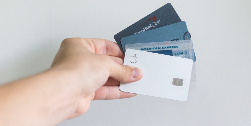 Person holding creadit cards 