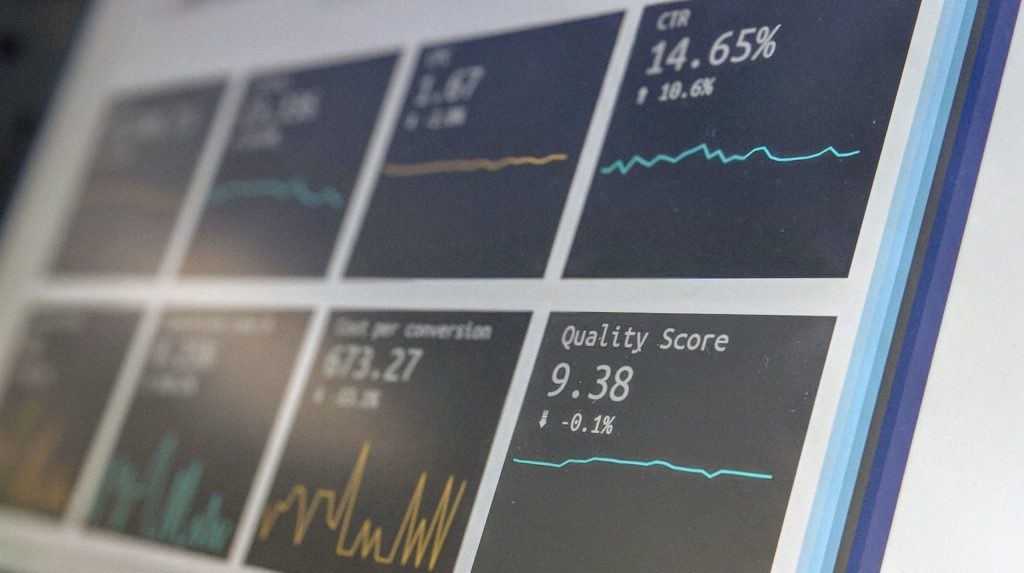 Data reporting dashboard on a laptop screen.