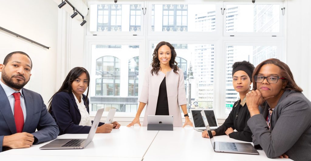 Group of coworkers on a board room